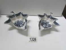 A pair of early 19th century blue and white soft paste leaf shaped dishes