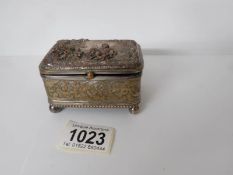 A French silver plated jewellery casket with lady on horse scene