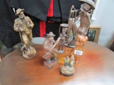 A collection of carved wood figures