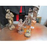 A collection of carved wood figures