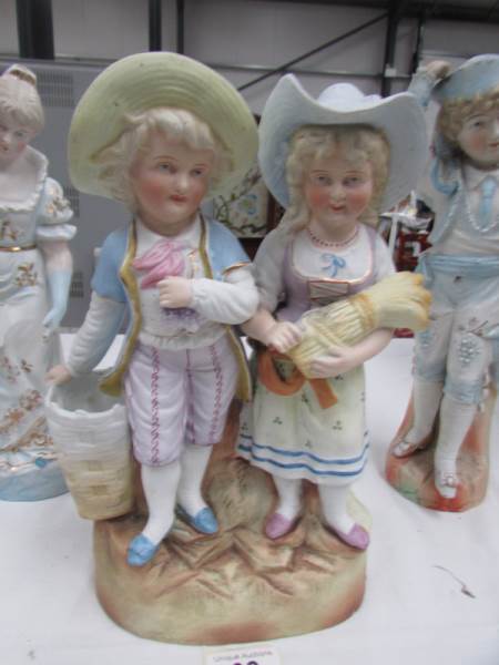 A 19th century continental bisque figure group and 2 other bisque figures - Image 3 of 4