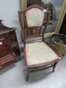 A mahogany inlaid chair