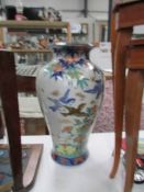 A large oriental vase,