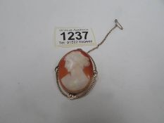 A 9ct gold cameo brooch with 9ct gold safety chain