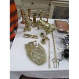 A quantity of brass ware including candlesticks, figures,