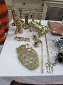 A quantity of brass ware including candlesticks, figures,
