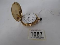 An 18ct gold minute repeater pocket watch with engraving on case,