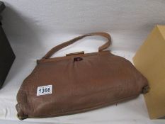 An Art deco leather hand bag