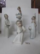 4 Lladro figurines including a lady holding a lamb and an angel