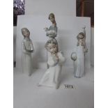 4 Lladro figurines including a lady holding a lamb and an angel