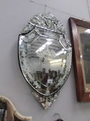 A wall mirror with etching