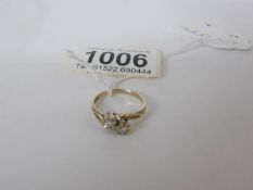 A 9ct yellow gold 2 stone crossover diamond ring,