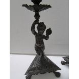 A pair of early 19th century bronze cherub candlesticks