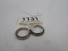 2 9ct gold and silver set eternity rings,