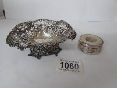 A silver dish and a silver ring