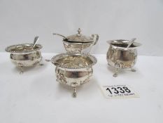 3 silver salts and a silver mustard pot with blue glass liner,