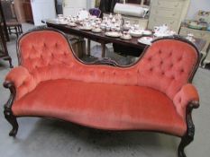 A mahogany double ended chaise longue