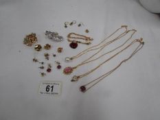A mixed lot of pendants,