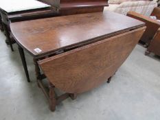 A period oak gate leg table