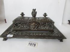 A late 19th century cast metal inkstand (missing inkwells)