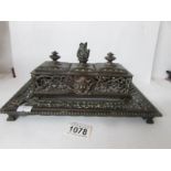 A late 19th century cast metal inkstand (missing inkwells)