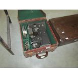 A vintage leather cased projector