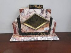 An art deco onyx/marble mantel clock