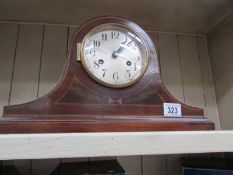 An inlaid mantel clock