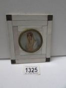 A miniature portrait painted on ivory