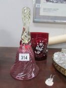 A cranberry glass bell and a hand painted ruby glass tankard