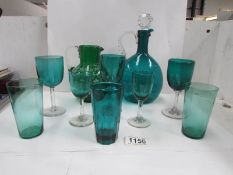 A green glass decanter,