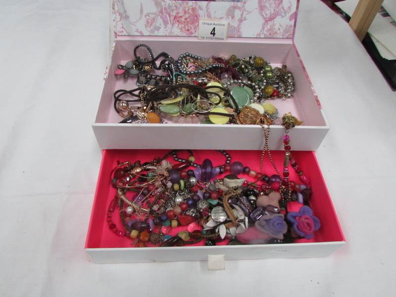 A jewellery box and costume jewellery