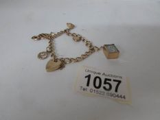 A 9ct gold charm bracelet,