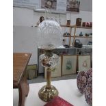 A Victorian brass oil lamp