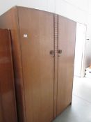 An old ply 2 door wardrobe