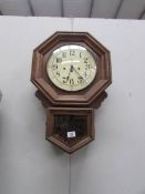 A drop dial regulator wall clock