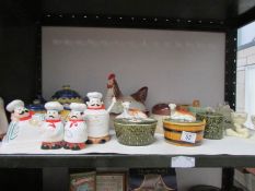 A shelf of miscellaneous including butter dishes etc