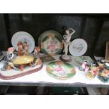 A shelf of miscellaneous plates,