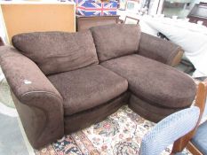 A brown 2 seat corner sofa