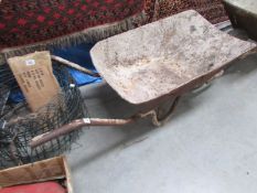 An old metal wheel barrow