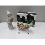 A boxed 'Cow Parade' cow figure and a LLadro figure