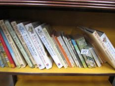 A quantity of books including William Harwood and Kenneth Grahame