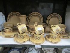 33 pieces of Kiln Craft dinner ware