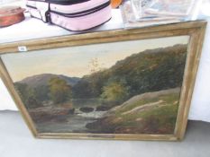 A large oil on canvas entitled Fishing in Grinmire by Edwin John Ellis