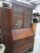 A mahogany bureau bookcase