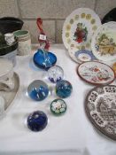 A mixed lot of glass paperweights and a glass swan dish