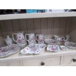 12 pieces of James Kent rose decorated china including set of 3 graduated jugs