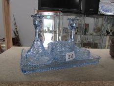 A blue glass trinket set
