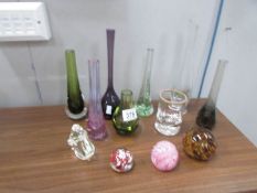 A quantity of art glass vases and paperweights