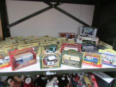 A shelf of boxed yesteryear models